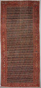 A carpet, Antique North west persian, ca 522 x 219 cm.