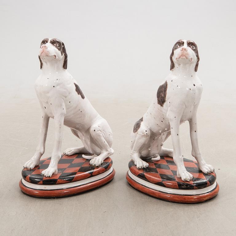 Decorative sculptures a pair England 20th century glazed ceramics.