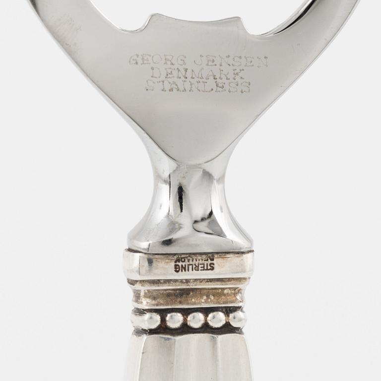 A sterlingsilver bottle opener, "Konge", Johan Rodhe for Georg Jensen.