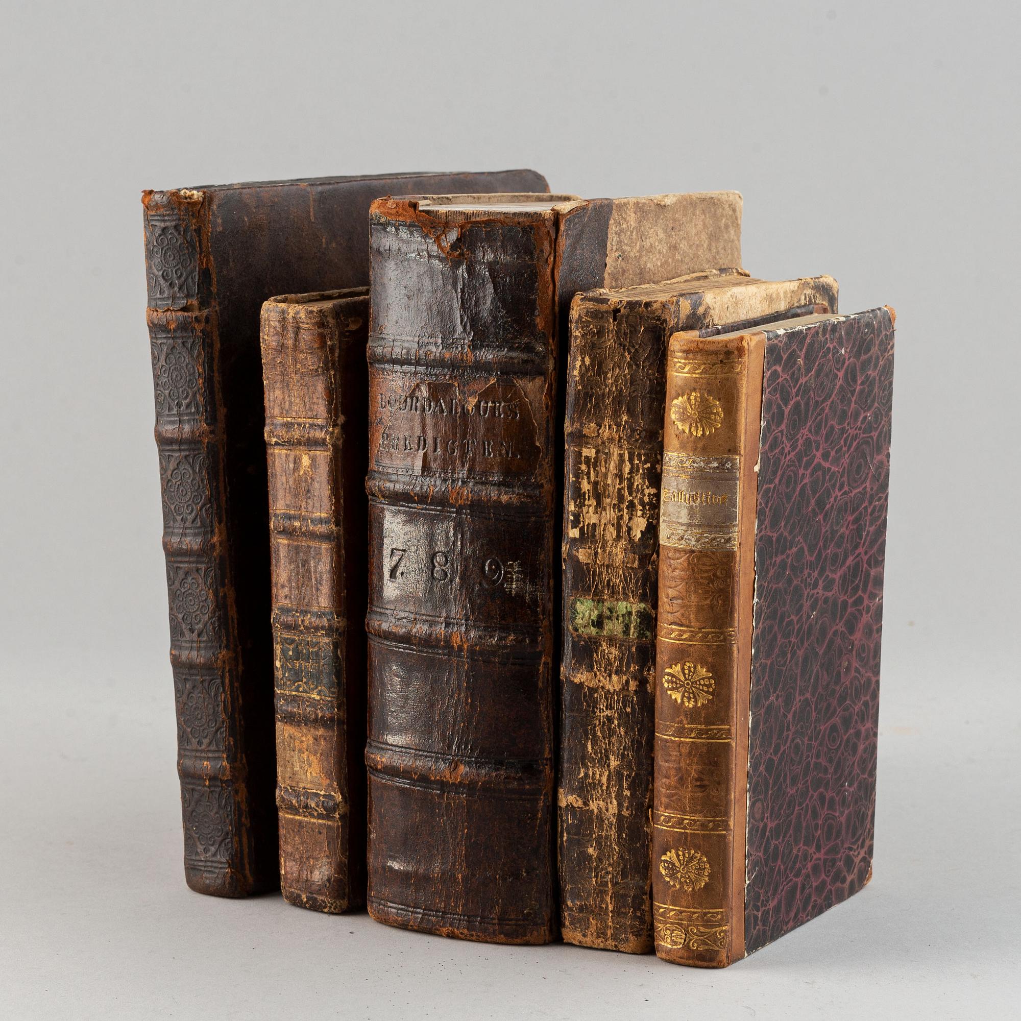 Five 18th century books.