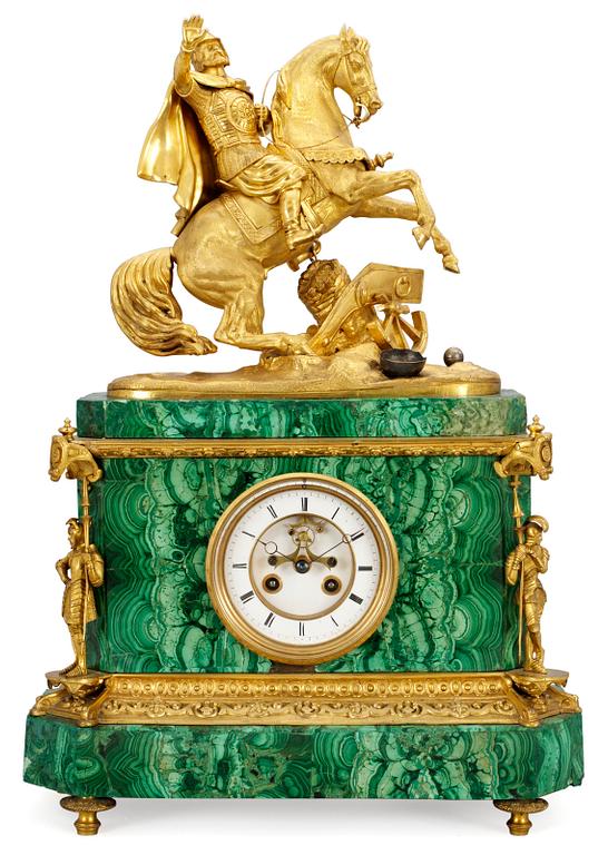 A French Malakit and gilt bronze mantel clock by Louis Japy, mid 19th century, for the Russian market.