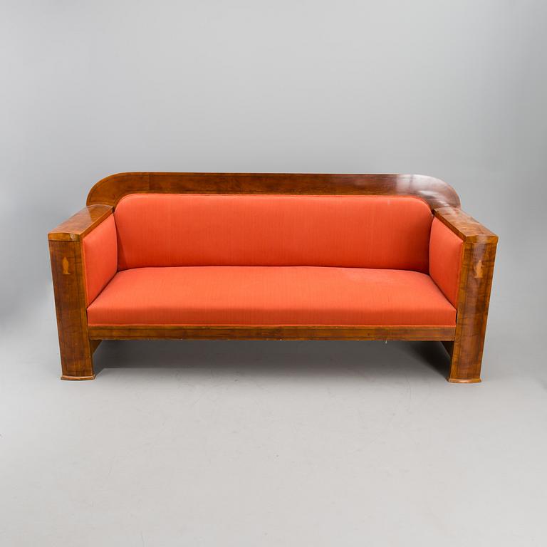 An 1820s Empire style sofa.