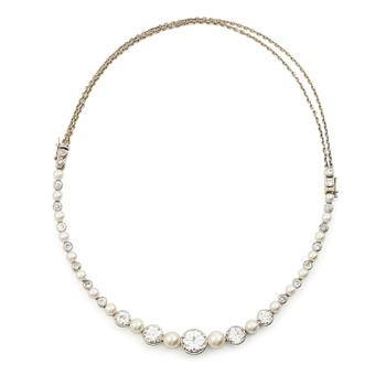 508. Bracelet/necklace platinum and 18K white gold with pearls and old-cut diamonds. Likely from the 1930s.
