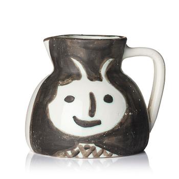 171. Pablo Picasso, a "Têtes" (A.R. 367) faience pitcher, Madoura, Vallauris, France, post 1956.