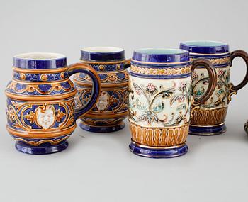 A set of eight majolica mugs from Rörstrand, around the turn of the century 1900.