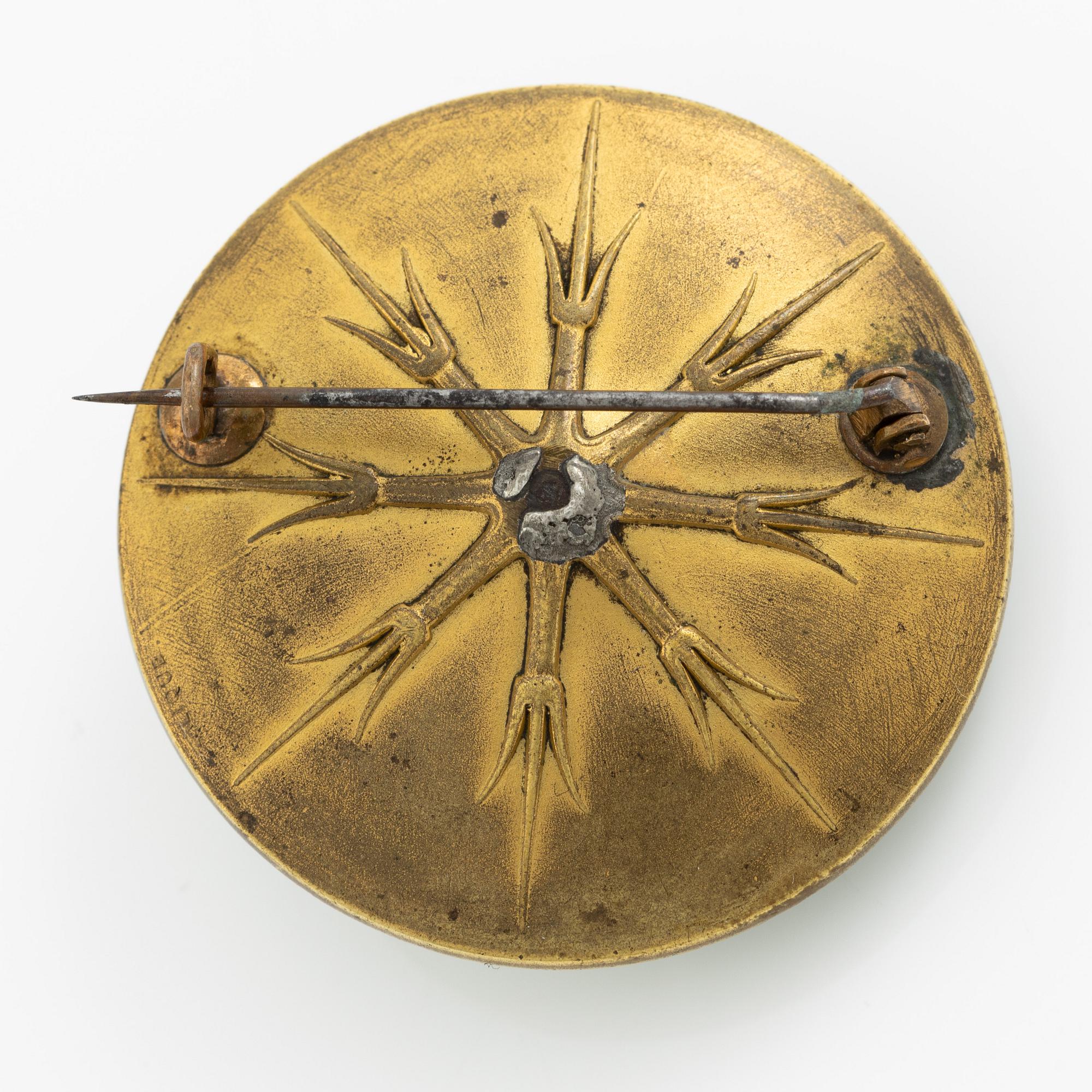 René Lalique, a brooch, glass, with a motif of crickets.