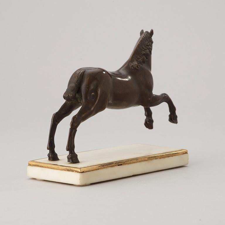 A Baroque 17th century bronze figure of a horse.