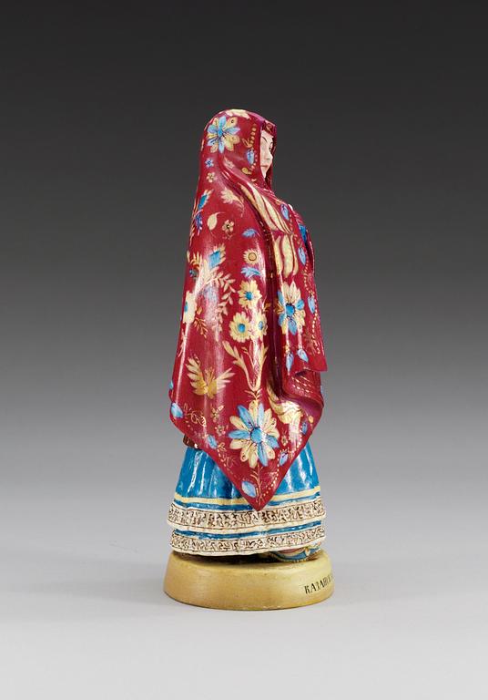 A Russian bisquit figure of a Tatar lady from Kazan, Gardner manufactory, second half of 19th Century.