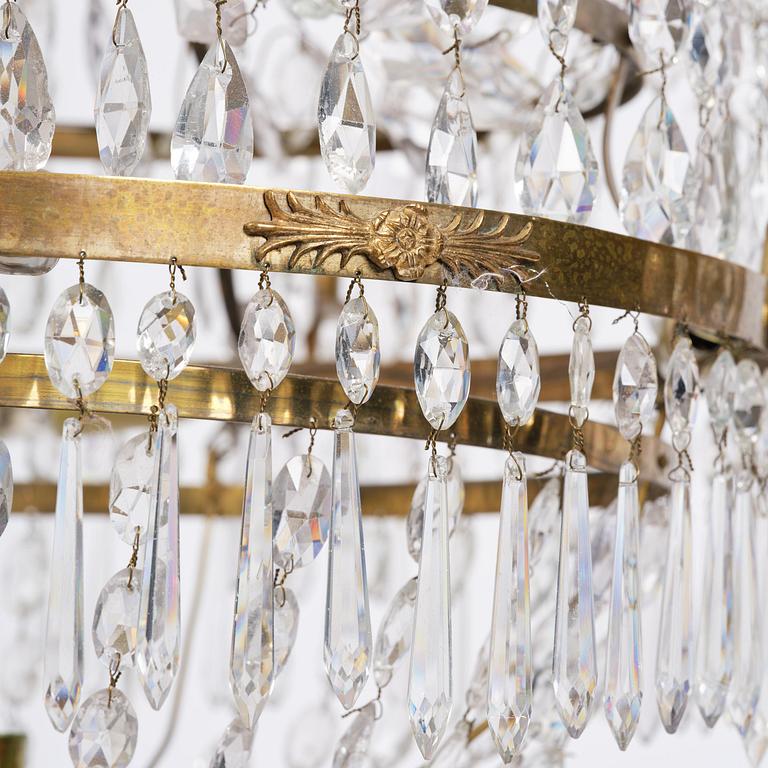 A late-Gustavian five-light gilt brass and cut glass chandelier, Stockholm, circa 1800.