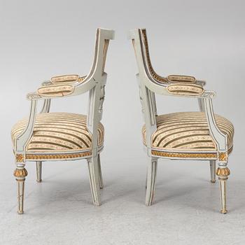 A pair of Gustavian style armchairs, 19th Century.