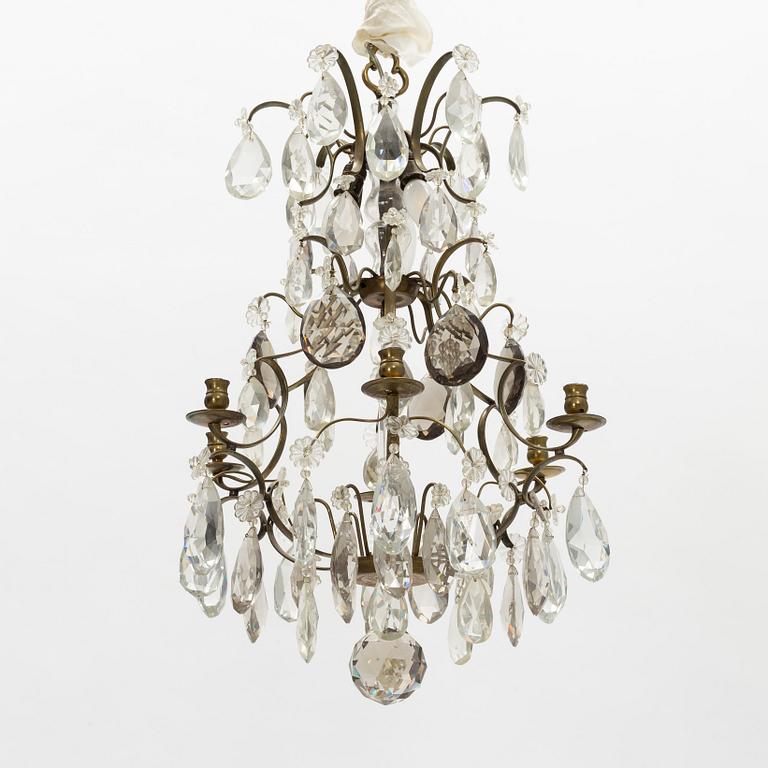 A Rococo style chandelier, mid 20th Century.