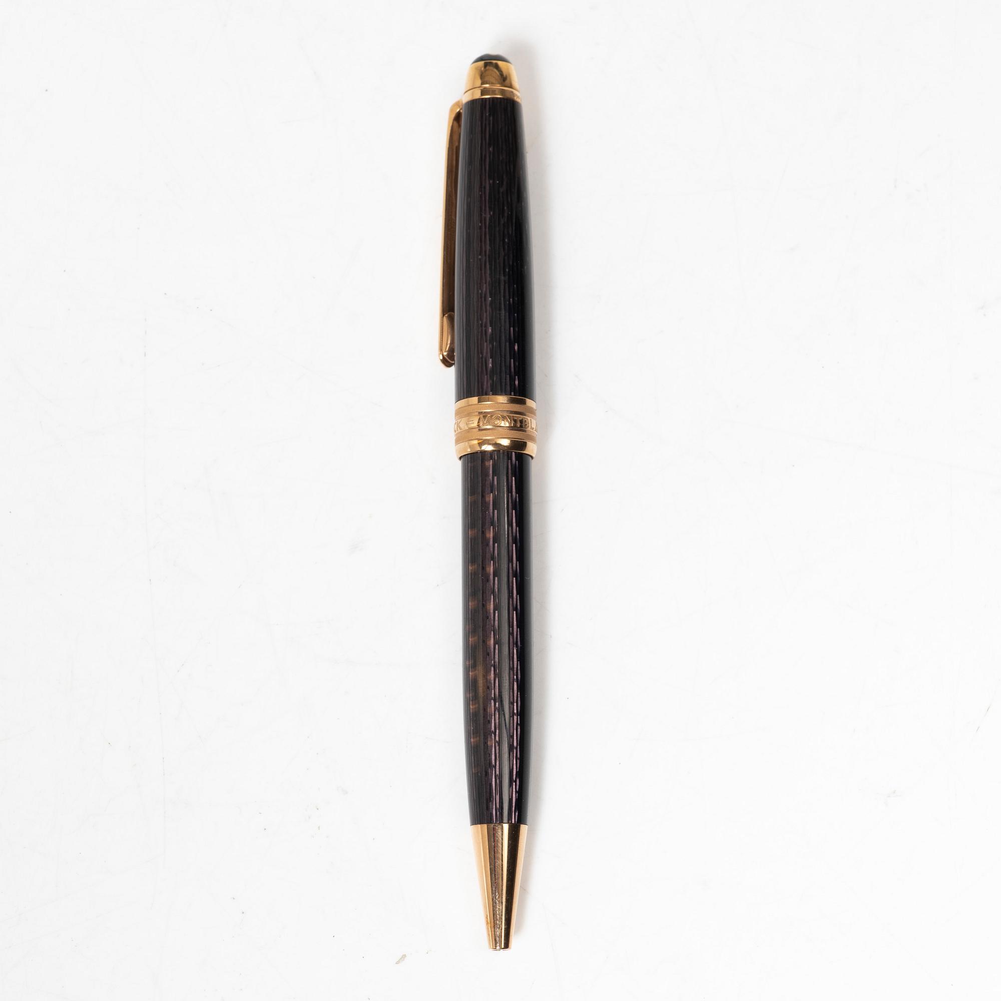 A Mont Blanc Meisterstück 90th Anniversary ed.  ballpoint pen with a case.