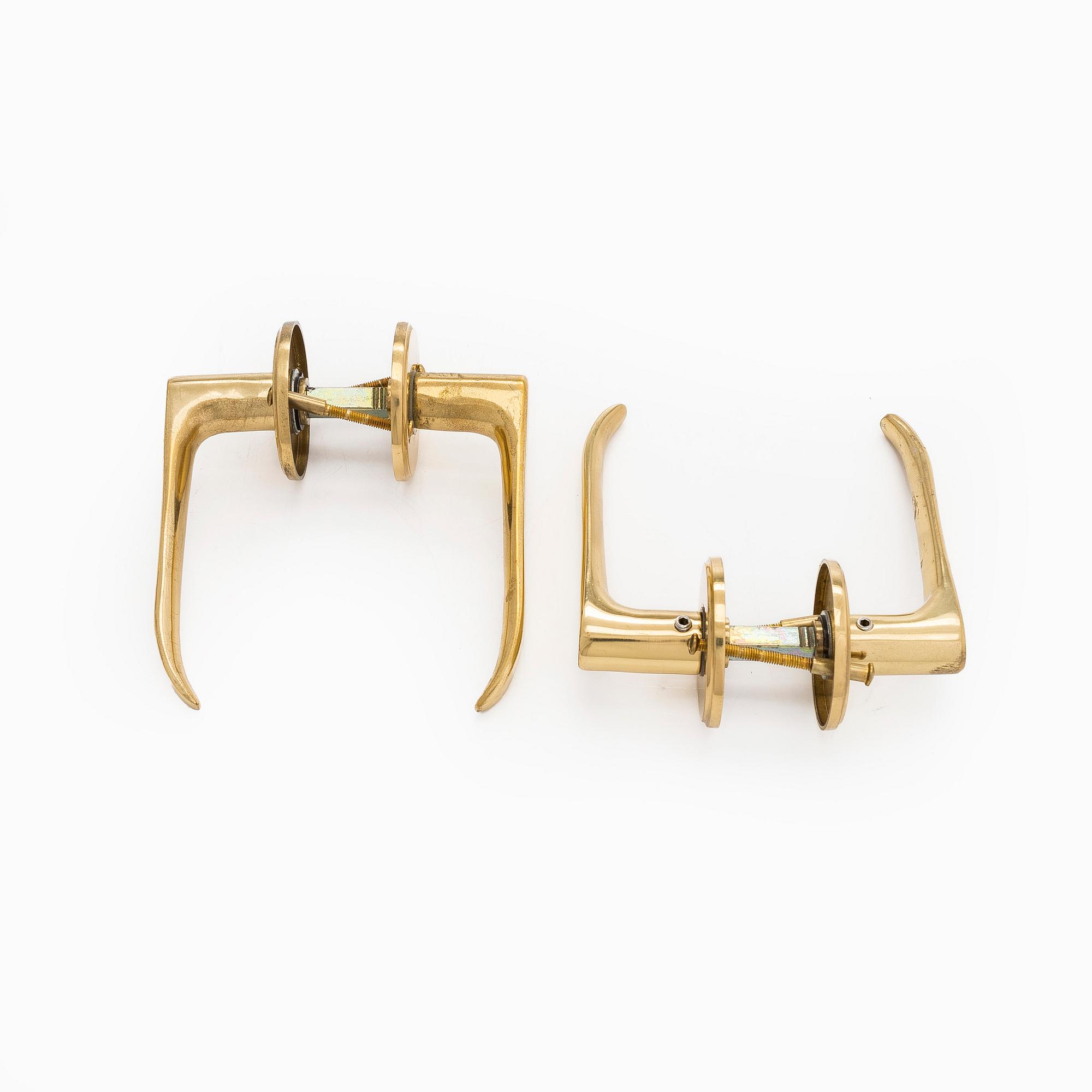 A set of 8 + 2 mid and late 20th century door handles.
