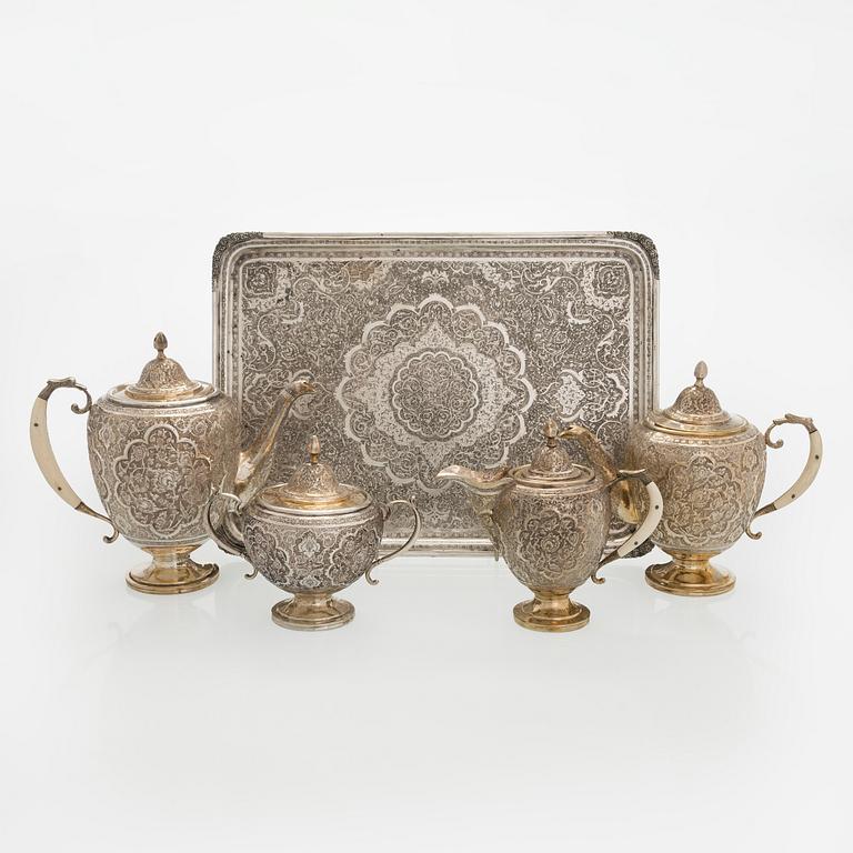A 5-piece Persian tea service, first half of the 20th century.