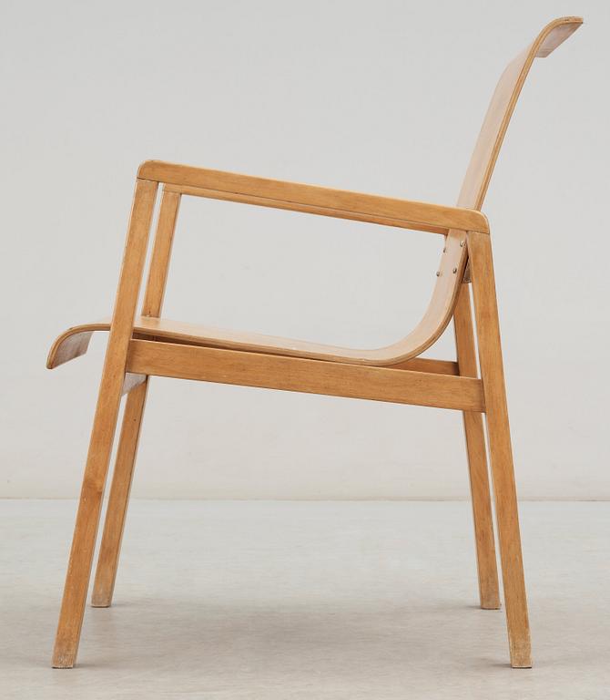 An Alvar AAlto birch plywood armchair, model 51, Huoneakalu-ja Rakennustyötehdas Oy, Artek, Finland.