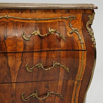 A rococo parquetry commode by C. G. Willkom (master in Stockholm 1763-65).