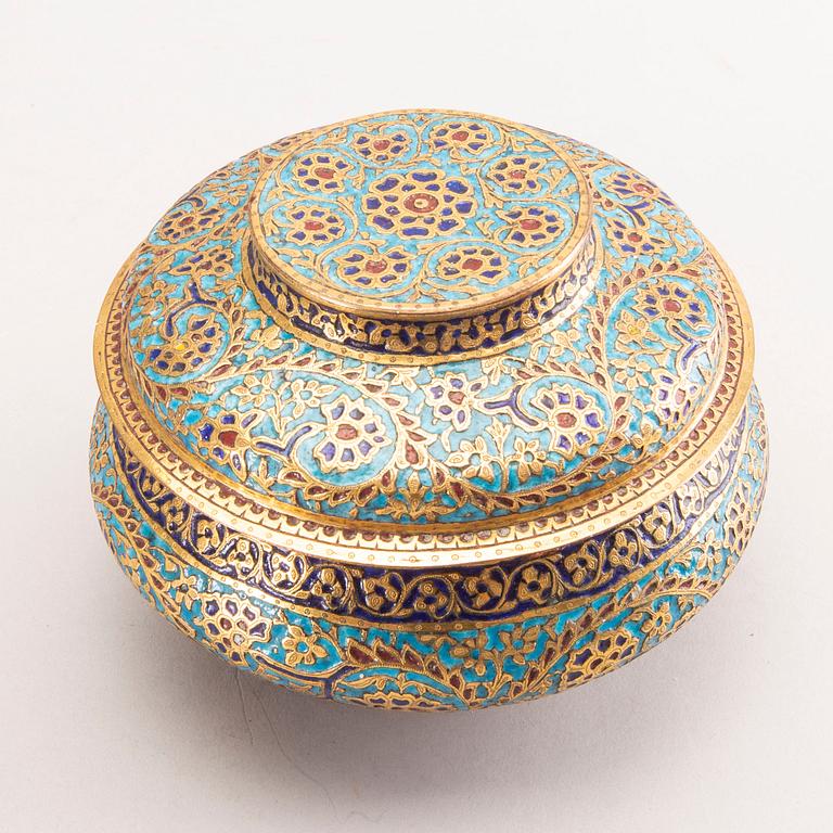 An Indian 19th century gilded jar with lid.