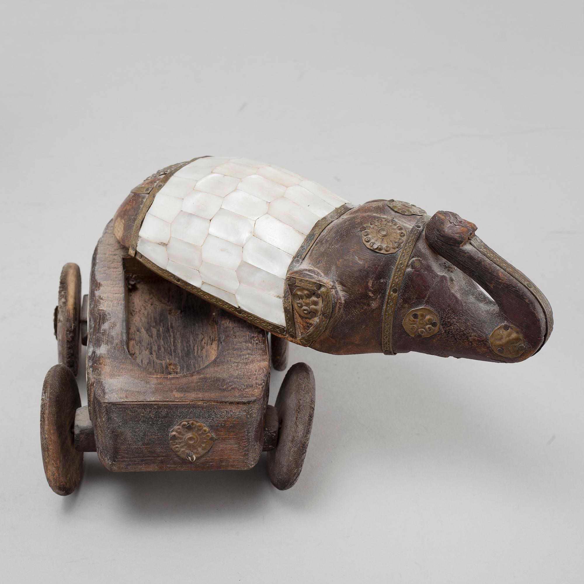 Five wooden toys from the latter half of the 20th century.