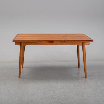 Hans J Wegner, a teak dining table, Andreas Tuck, Denmark.
