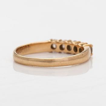 Sormus, 14K kultaa, ja briljanttihiottuja timantteja.Suomalaiset tuontileimat 1989.