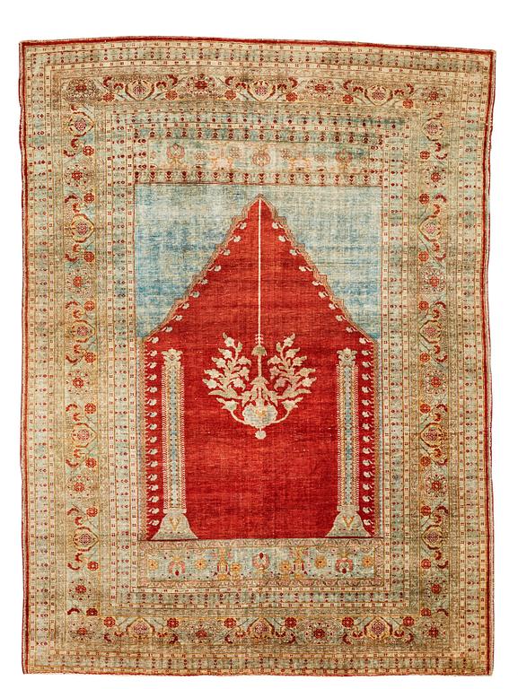 MATTO, an antique silk Tabriz, ca 165 x 122,5 cm.