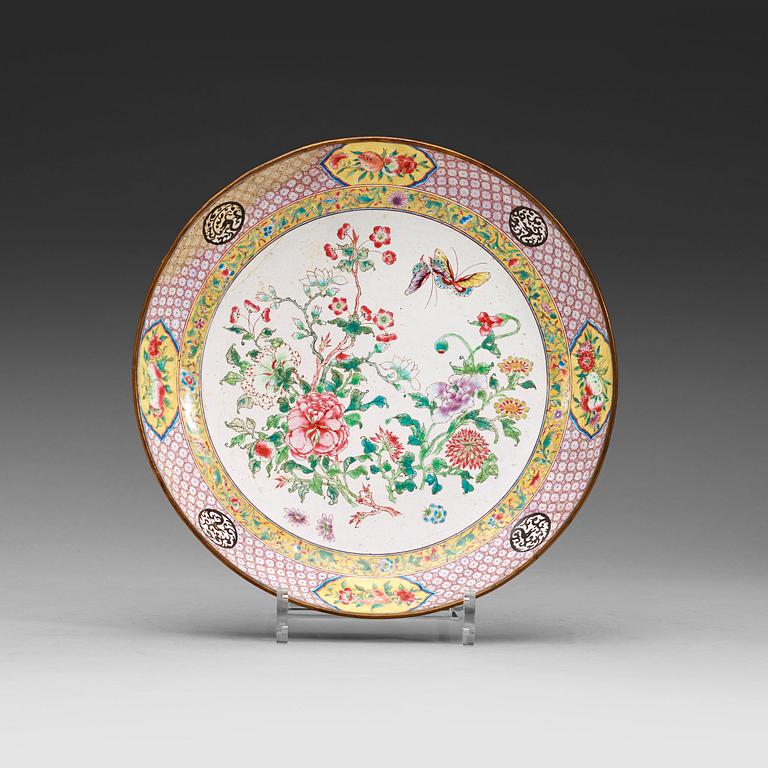 An enamel on copper dish, Qing dynasty 18th century.