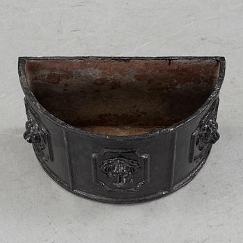 A cast iron jardeniére, 20th century.