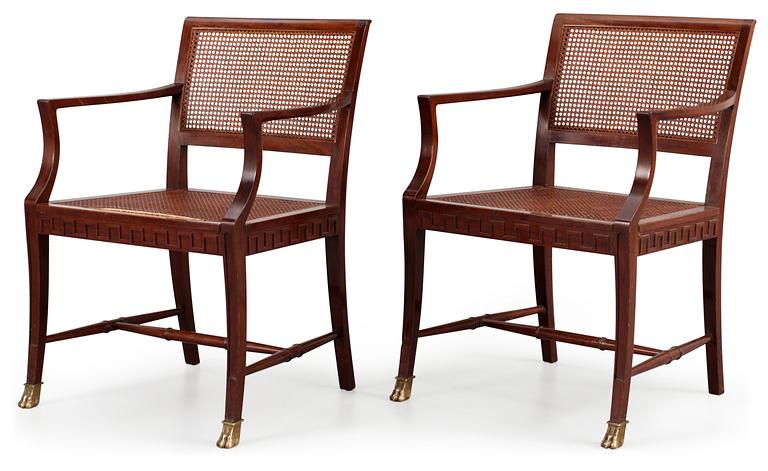 A pair of mahogany and ratten armchairs, Nordiska Kompaniet, Stockholm 1920's-30's.