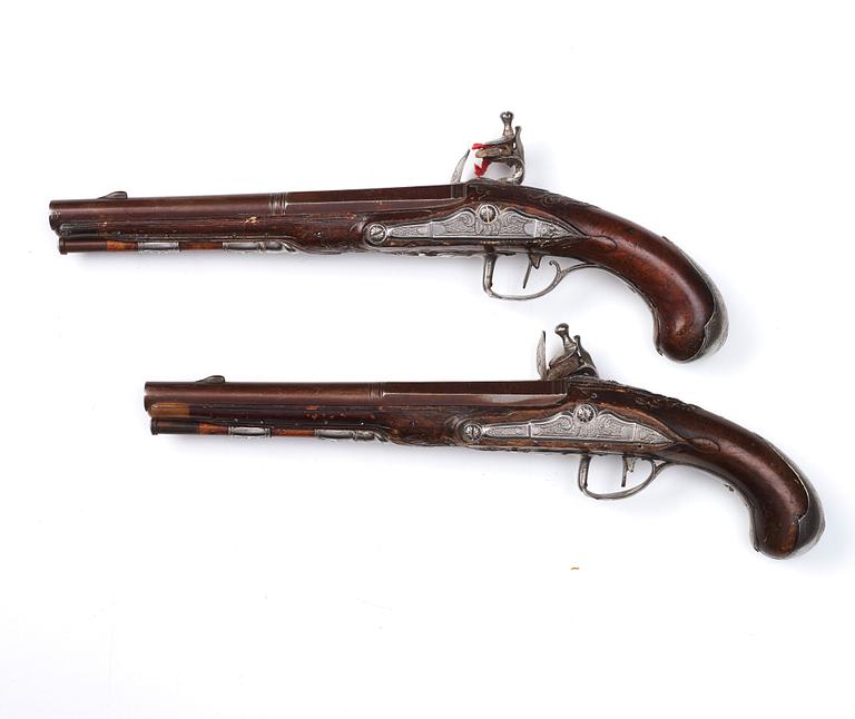 A pair of Swedish flintlock pistols by Petter Rundberg (1718-80), master in 1752.