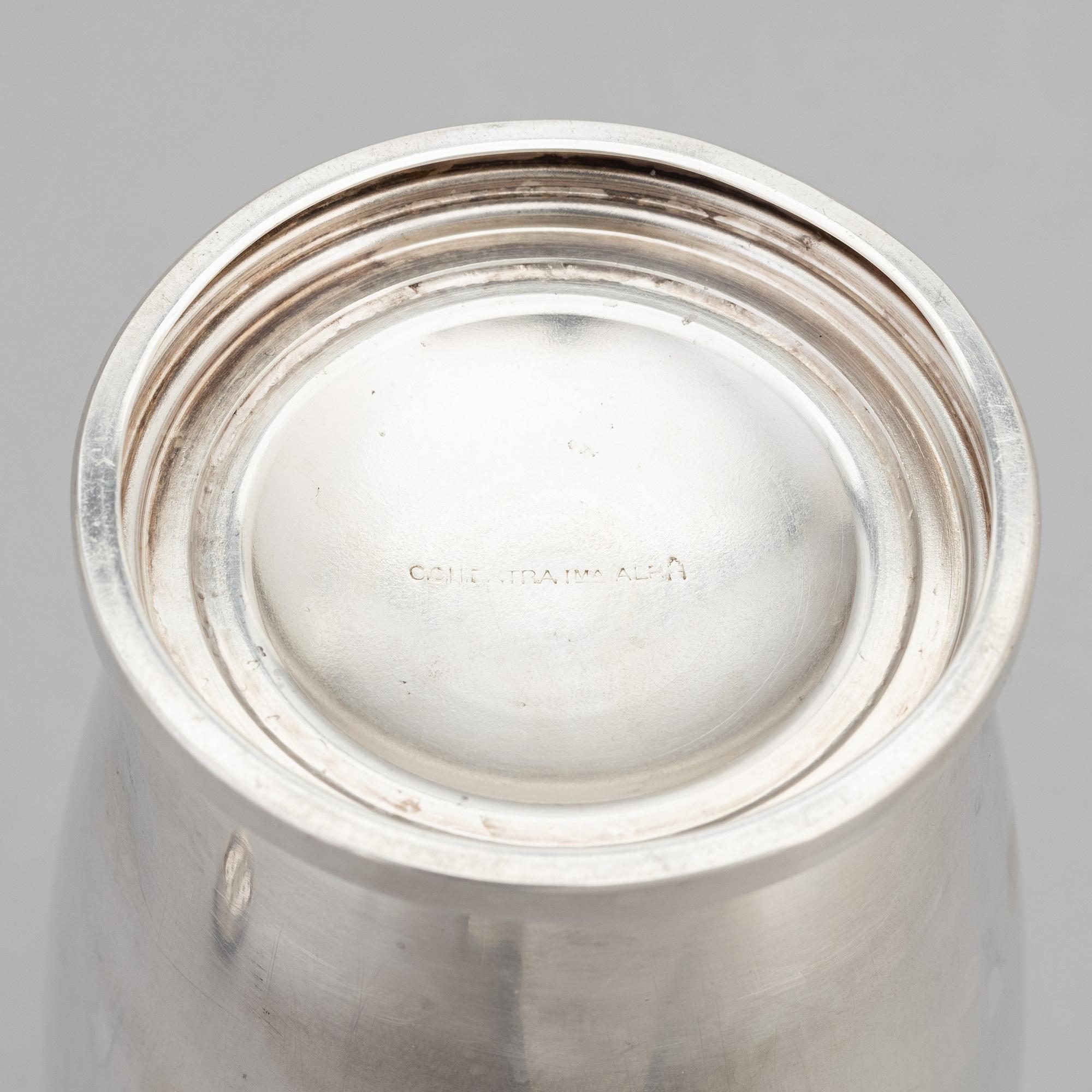 A silver plated shaker, C.G. Hallberg and a set of twelwe cocktail glasses, GAB, second half of the 20th Century.