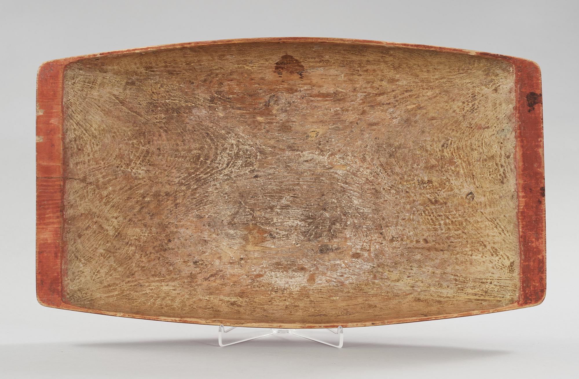 A wooden bowl from the 19th century.