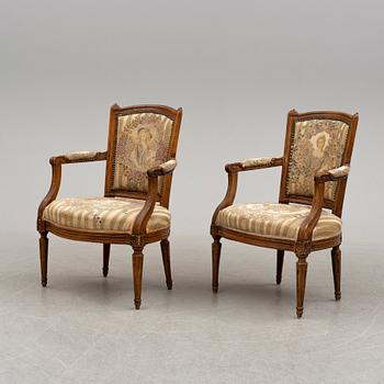 A pair of 18th/19th century armchairs.