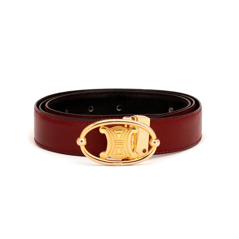 CÉLINE, a wine-red leather belt.