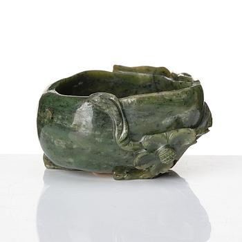 A peach shaped green stone brush washer, Qing dynasty.