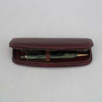 Montblanc, a fountain pen and a pencil in a leather case, 1950's.