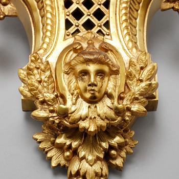 A wall clock in Louis XVI style with clockwork by Japy Frères & Cie, made around year 1900.