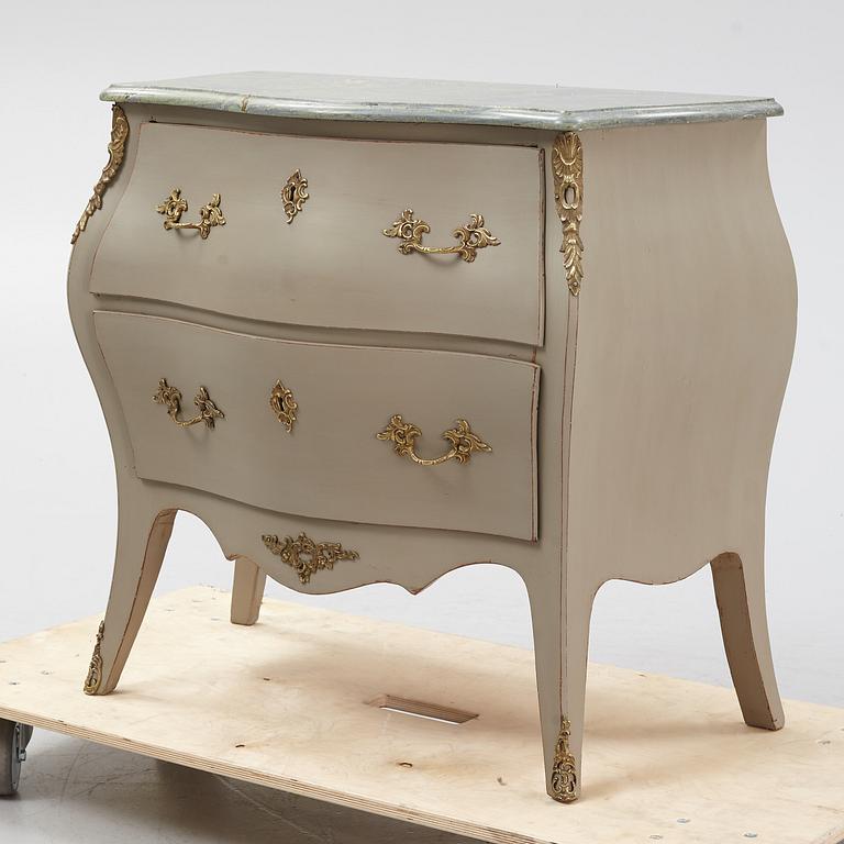 A mid 20th century rococo-style chest of drawers.