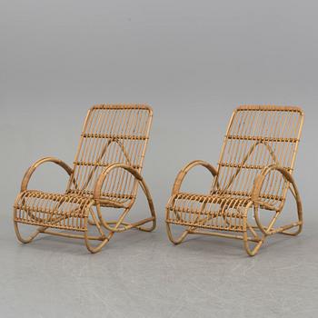 A pair of bamboo and rattan easy chairs, 1940's/50's.