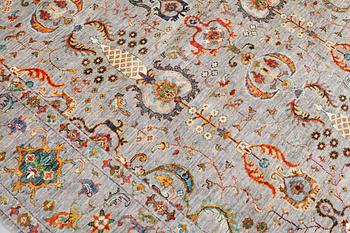 A rug, Ziegler design, approx. 240 x 172 cm.