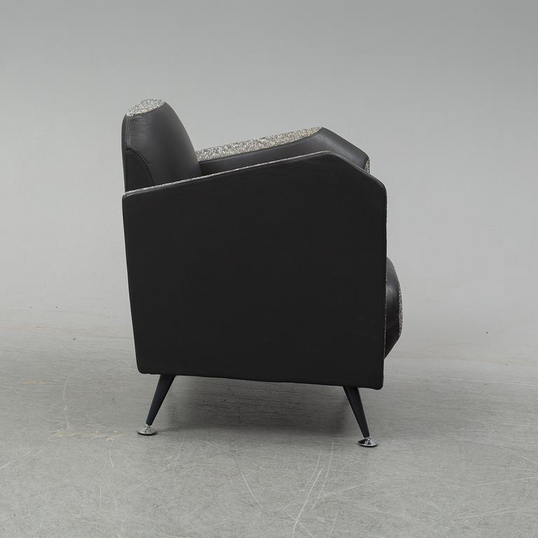 A 'Hotel 21' easy chair by Javier Mariscal for Moroso designed 1995.