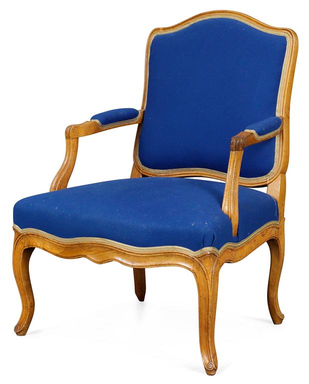 A Louis XV armchair.