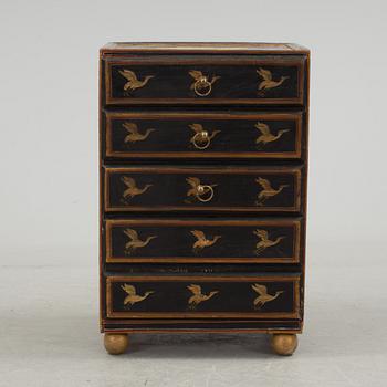 A 20th century oriental drawer.