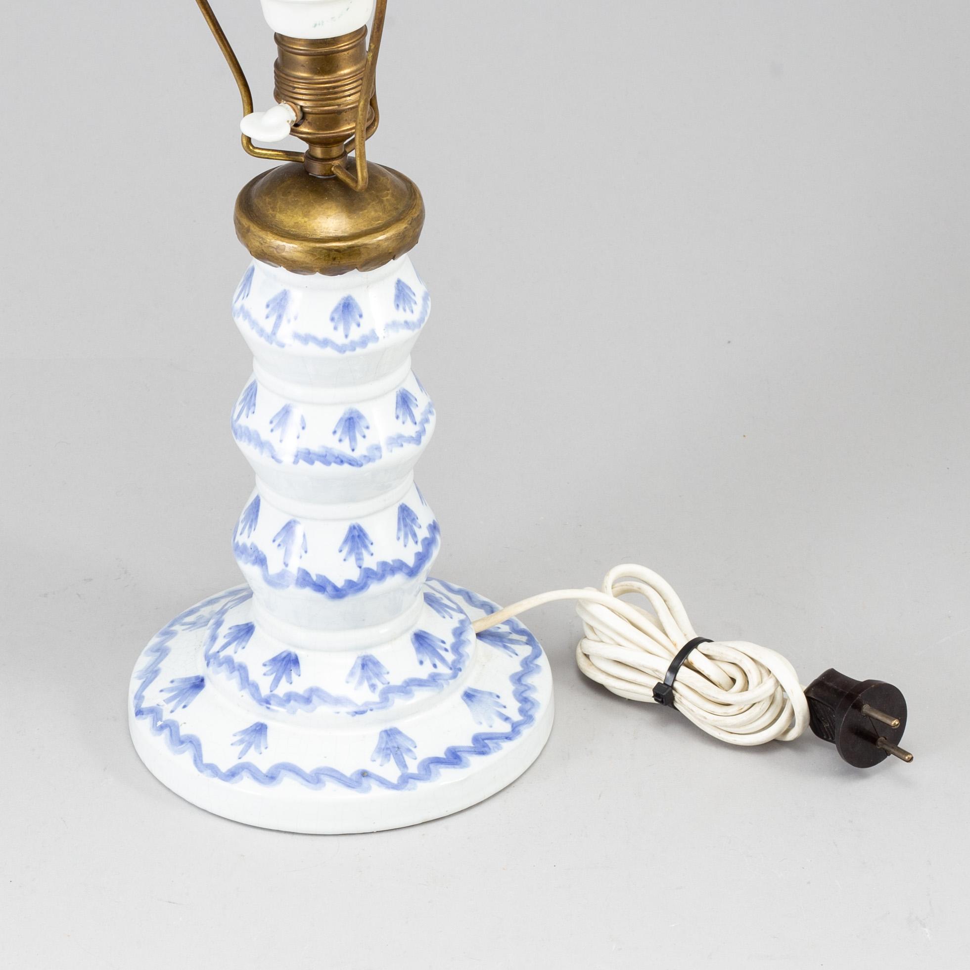 WILHELM KÅGE, a creamware table lamp, Gustavsberg, Sweden, dated 1920.
