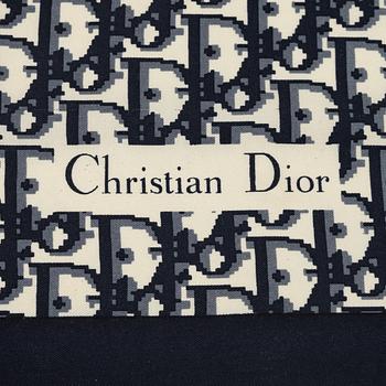 Christian Dior, a clutch and silk scarf.