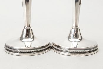 A Swedish 20th century pair of silver candle sticks mark of E Löfman Uppsala 1982.