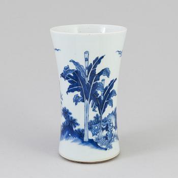 A blue and white vase, Transition style, second half of 20th Century. A cup with stand, Qing dynasty, 18th Century.