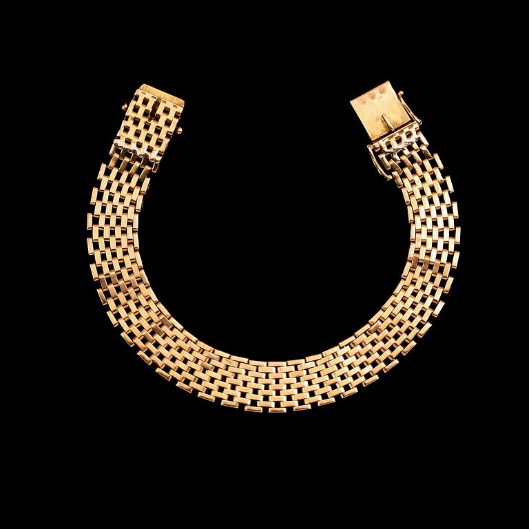 ARMBAND, 18 k guld, svenska stämplar Stockholm 1960. Vikt ca 27 g.