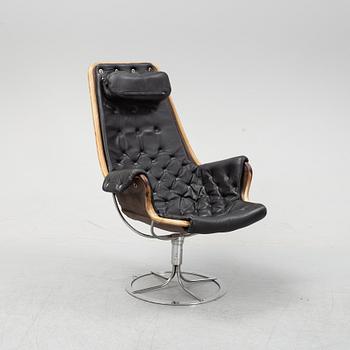 A 'Jetson' swivel easy chair with leather upholstery by Bruno Mathsson, for Dux.