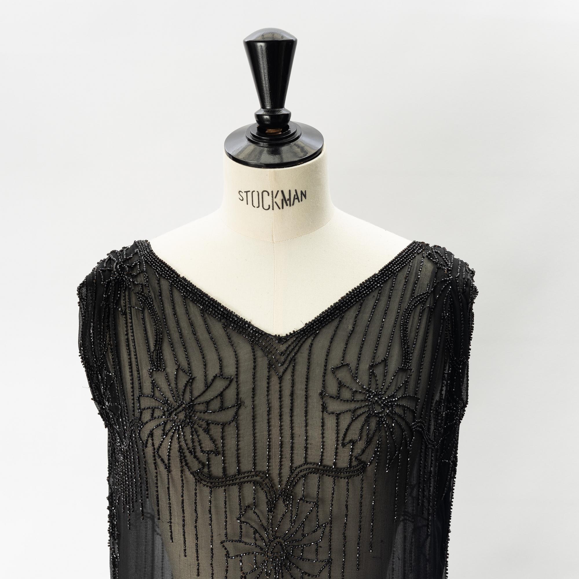 A 1920's pearl embroidered dress.