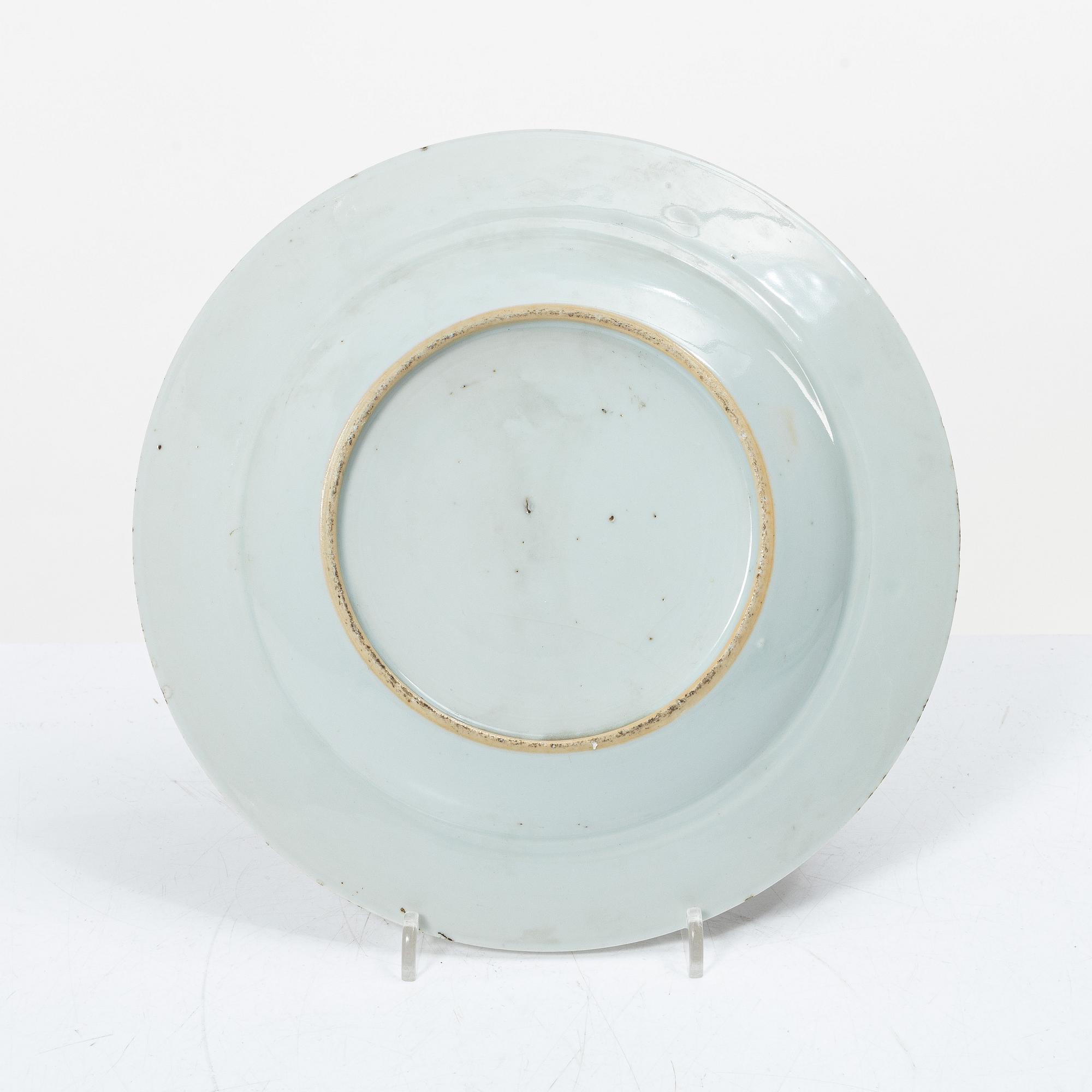 Seven export porcelain plates, China, Qing dynasty, 18th century.